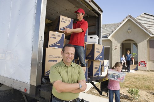 Professional packing service organising household items room by room