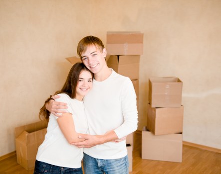 Professional removals team managing furniture in a Tolworth home