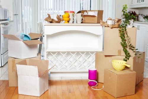 Removal van and moving boxes for a Tolworth house move