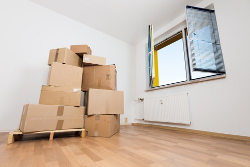 Professional moving team handling a removals van near Tolworth
