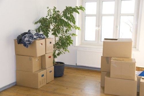 Removal team handling furniture and boxes for a home move