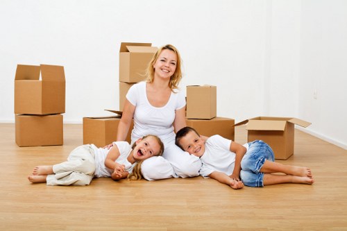 Preparing boxes and furniture for removal truck hire in Tolworth